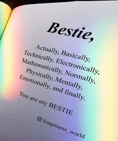 an open book with the words bestie written on it's cover and rainbow light coming from behind