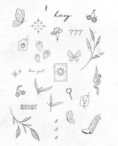 an image of various tattoos drawn on paper