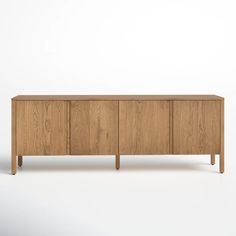 the sideboard is made out of wood and has three doors