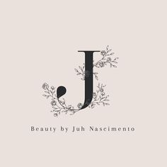 the letter j is made up of branches and flowers, with an elegant monogram