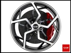 a wheel with red brake pads on it