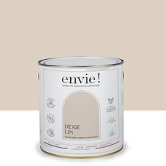 a paint can with the words envie on it and an image of a beige background