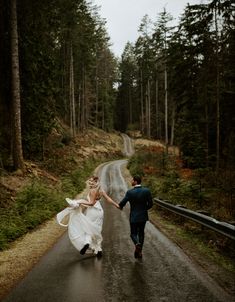 a bride and groom running down the road