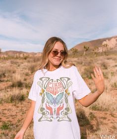 ATTENTION: IF YOU WOULD LIKE THE SHIRT TO APPEAR OVERSIZED, WE RECOMMEND THAT YOU ORDER TWO SIZES ABOVE YOUR ORIGINAL SIZE. Thank you for stopping by at The Dancing Phoenix Co! ✨ This vintage Butterfly Shirt is made-to-order just for you with love. Also a cool gift idea for family and friends. 👉🏻 HOW TO ORDER 1. Please Check and Review all the Photos 2. Select your Shirt Colour and Size from the drop down menu 3. Choose your Quantity 4. Click "Add To Cart". You can go back to add more of your Bohemian Vintage Print T-shirt For Spring, Spring Bohemian T-shirt With Screen Print, Spring Fairycore Graphic Print T-shirt, Cottagecore Tshirt, Fairycore Graphic Print Cotton T-shirt, Boho Tshirt, Pink Bohemian Graphic T-shirt, Celestial Shirt, Butterfly T Shirt