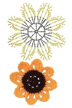 two crocheted flowers on a white background, one is orange and the other is brown