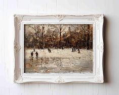 a painting hanging on the wall next to a white frame with people playing in it