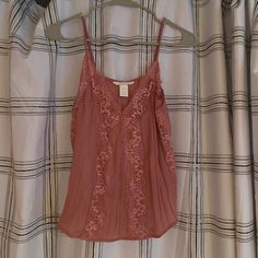 H&M Camisole With Lace Pink Flowy Tank Top With Lace And Adjustable Straps, Like New Never Worn. Size Xs But Could Fit A Small As Well. #Hm #Lace #Tanktop H&m Tank Top For Spring, H&m Sleeveless Tops For Spring, Casual Sleeveless Tops From H&m, H&m Sleeveless Tank Top For Spring, Casual Sleeveless H&m Tops, Chic H&m Tank Top For Summer, Chic Summer H&m Tank Top, Casual Sleeveless Tops By H&m, H&m Casual Sleeveless Top