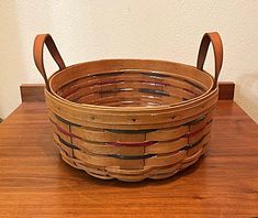 a basket sitting on top of a wooden table