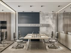 an empty conference room with chairs and desks in front of a sign that reads team work