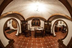 a fish eye view of a dining room and kitchen