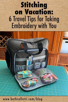 an open suitcase sitting on top of a table with the words stitching on vacation 6 travel tips for taking embroidery with you