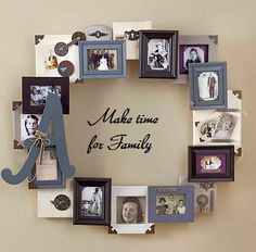 a heart shaped photo frame with many pictures hanging on it's sides and a clock in the middle