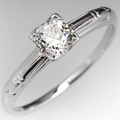 an engagement ring with a diamond in the center