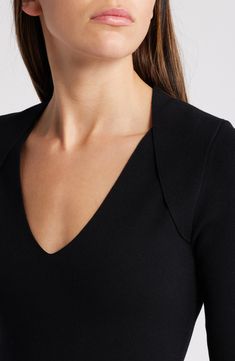 Build up your basics wardrobe with this V-neck top boasting raised seams at the shoulders for stylish flair. 23" length V-neck Elbow-length sleeves 63% viscose, 36% polyamide, 1% elastane Hand wash, dry flat Imported Elegant Black V-neck Sweater For Work, Sleek V-neck Tops For Spring, Fitted Black V-neck Knit Top, Fitted V-neck Knit Top For Fall, Sleek V-neck Top For Fall, Sleek Viscose Tops For Fall, Formal Fitted V-neck Tops, Structured Fitted Tops For Fall, Fitted Structured Tops For Fall