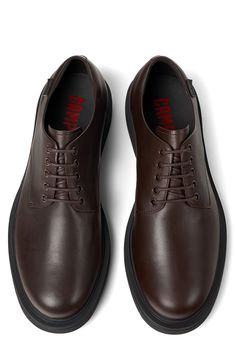 A lightweight outsole keeps things comfortably cushioned in this lace-up derby crafted to be a timeless classic. Lace-up style XL EXTRALIGHT® sole is lightweight, flexible and shock absorbent Leather upper/textile lining/synthetic sole Imported Up Styles, Timeless Classic, Derby, Dark Brown, Dress Shoes Men, Shoes Mens, Leather Upper, Dress Shoes, Nordstrom