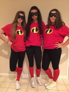 three girls dressed up as the incredibles