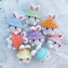 small crocheted stuffed animals are arranged in a circle