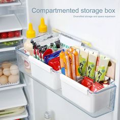 the refrigerator door is open and filled with various items in containers, including juices, condiments, and eggs