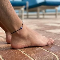 Protect your energy and enhance your style with our Evil Eye Anklet. This adjustable, waterproof ankle bracelet features a lucky eye charm, making it perfect for women, men, and teens. Crafted with a durable cord, it’s ideal for the beach, surfing, or any outdoor activity. The unisex design ensures it's a versatile accessory for anyone. Enjoy both protection and fashion with this anklet, perfect for everyday wear and summer adventures. Evil Eye Anklet, Protect Your Energy, Beach Surfing, Bracelet Pack, Charm Making, Ankle Bracelet, Anklet Bracelet, Crystal Charm, Summer Adventures