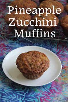 pineapple zucchini muffins on a plate with the title overlay