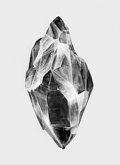 a black and white photo of a diamond