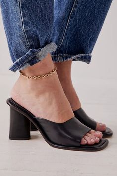 So simple and classic, these easy mules feature a square open toe with a chunky block heel for an extra chic pair. Mule Sandals Outfit, Free People Fall, Mule Heel, Block Heel Mules, Mule Heels, Heeled Mule, Heeled Mules Sandals, Sandals Outfit, Free People Style