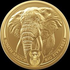 a gold coin with an elephant on it