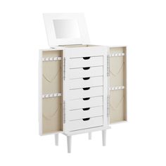 an open white cabinet with drawers and a mirror on the top one drawer is closed