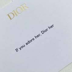 a close up of a piece of paper with the words dior written on it