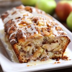 a piece of cinnamon apple bread on a white plate