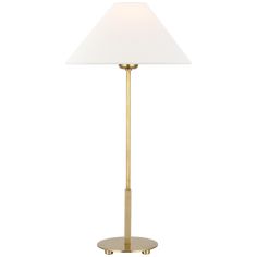 a lamp with a white shade on the base and a gold plated metal base