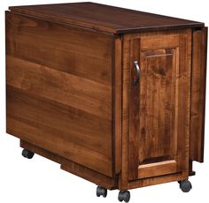 a wooden cabinet sitting on wheels with one door open