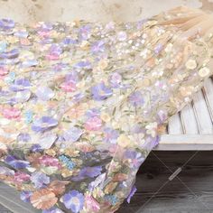 an image of a bed with flowers on it