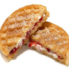 two pastries cut in half sitting on top of a white surface with words below it