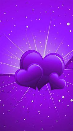 two purple hearts floating in the air