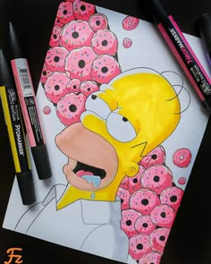 the simpsons is surrounded by donuts and crayons on this drawing book cover