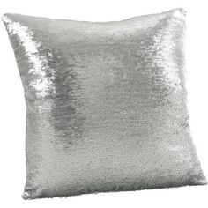 a silver sequin pillow on a white background