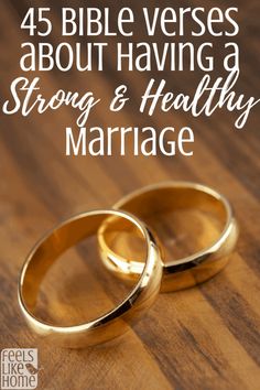 two gold wedding rings sitting on top of a wooden table with the words, 45 bible verses about having a strong and healthy marriage