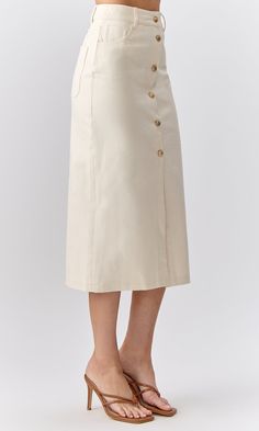 Relaxed Cotton Skirt With Buttons, Midi Length Skirt With Belt Loops, Cotton Skirt With Belt Loops For Work, Long Cotton Skirt With Buttons, Cotton Button-up Lined Skirt, Cotton Skirt With Button Closure, Button-up Cotton Skirt With Buttoned Pockets, Cotton Long Skirt With Buttons, Beige Midi Length Bottoms For Daywear