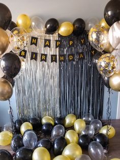 a birthday party with balloons and streamers