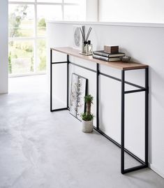 a shelf with some books on top of it