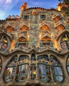 an ornate building with many windows and balconies