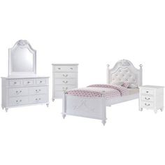 a white bed with two nightstands and a night stand