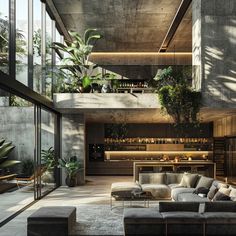 a living room filled with lots of furniture and plants on the wall next to it