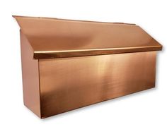 a shiny copper metal box on a white background