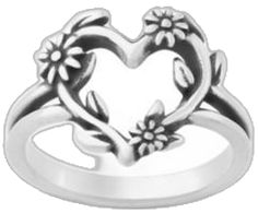 a heart shaped ring with flowers on it