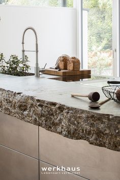 the kitchen counter is clean and ready to be used for cooking or baking, as well as bread