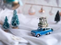 a toy car with a christmas tree on top