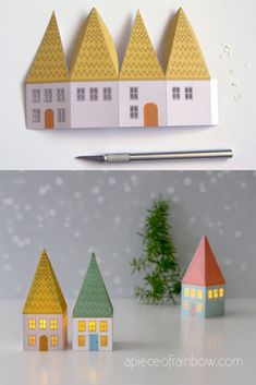 paper houses are lined up next to each other