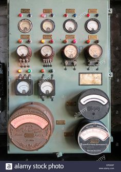 an old control panel with various gauges and switches